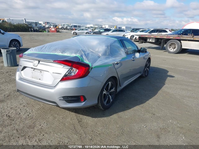 Продаж на аукціоні авто 2017 Honda Civic Touring, vin: 2HGFC1F99HH109482, номер лоту: 12727769