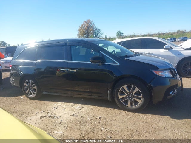 12727801 :رقم المزاد ، 5FNRL5H91GB509976 vin ، 2016 Honda Odyssey Touring مزاد بيع