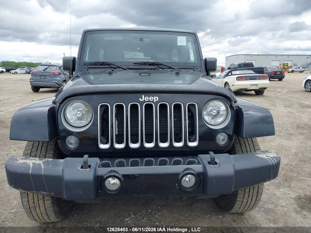 12628403 :رقم المزاد ، 1C4BJWEG8GL126047 vin ، 2016 Jeep Wrangler Unlimited Sahara مزاد بيع