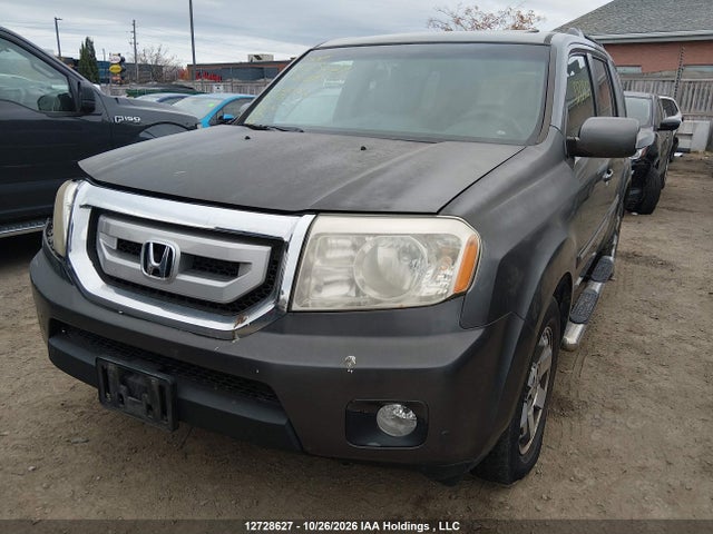 2011 Honda Pilot Touring მანქანა იყიდება აუქციონზე, vin: 5FNYF4H91BB024422, აუქციონის ნომერი: 12728627