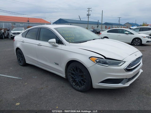12721933 :رقم المزاد ، 3FA6P0PU4JR130143 vin ، 2018 Ford Fusion Energi Se Luxury مزاد بيع