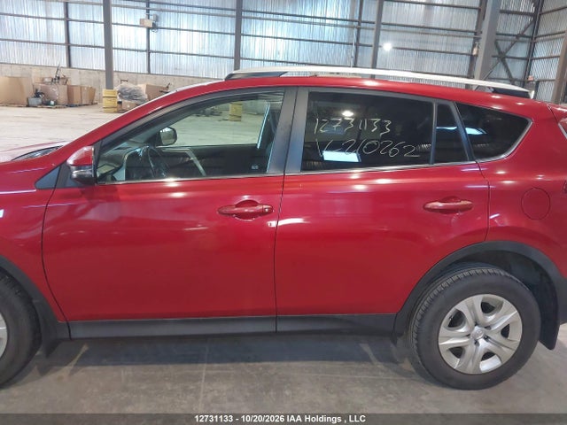 2T3ZFREV0FW210262 Toyota RAV4 LE