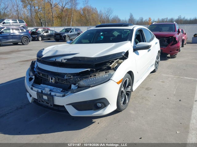 Auction sale of the 2017 Honda Civic Touring, vin: 2HGFC1F92HH106147, lot number: 12731187