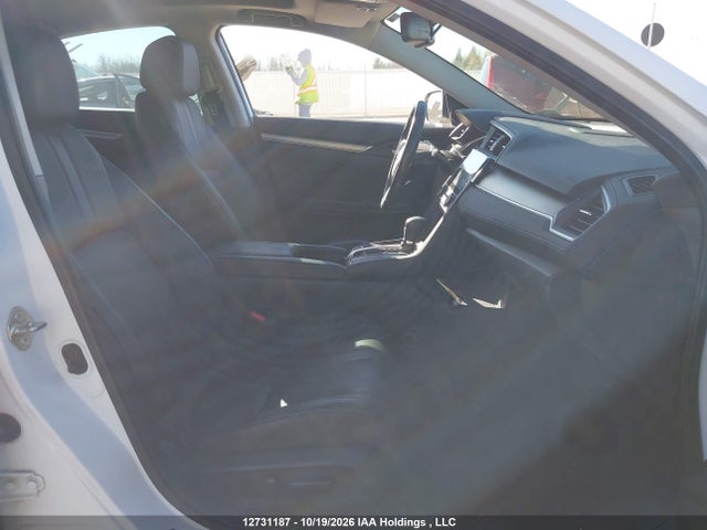 Auction sale of the 2017 Honda Civic Touring, vin: 2HGFC1F92HH106147, lot number: 12731187