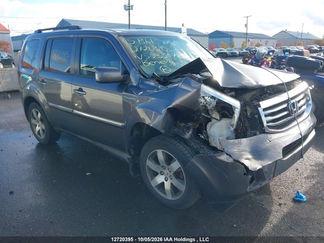 Продажа на аукционе авто 2015 Honda Pilot Touring, vin: 5FNYF4H97FB503367, номер лота: 12720395