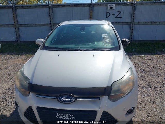 Продажа на аукционе авто 2012 Ford Focus Titanium, vin: 1FAHP3N23CL208330, номер лота: 12711144