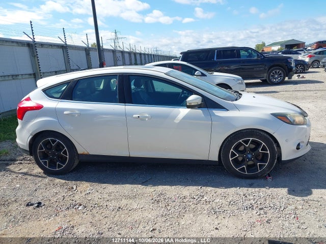 Продажа на аукционе авто 2012 Ford Focus Titanium, vin: 1FAHP3N23CL208330, номер лота: 12711144