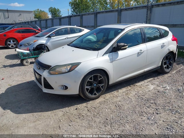 Продажа на аукционе авто 2012 Ford Focus Titanium, vin: 1FAHP3N23CL208330, номер лота: 12711144