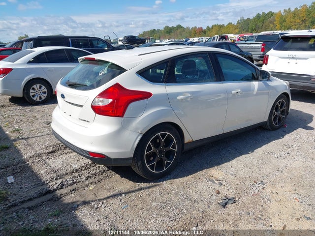 Продажа на аукционе авто 2012 Ford Focus Titanium, vin: 1FAHP3N23CL208330, номер лота: 12711144