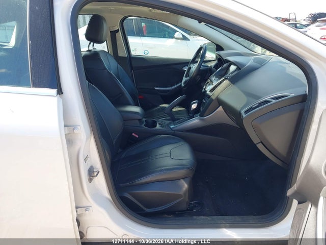 Продажа на аукционе авто 2012 Ford Focus Titanium, vin: 1FAHP3N23CL208330, номер лота: 12711144