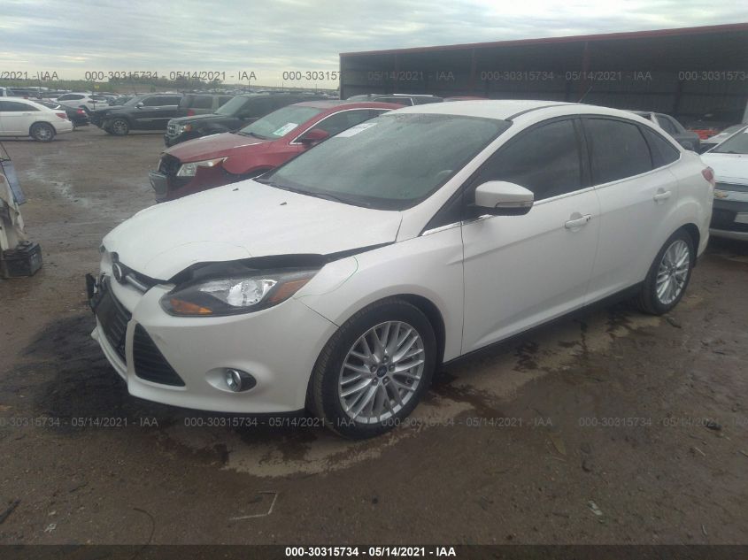 2013 FORD FOCUS TITANIUM 1FADP3J29DL105175