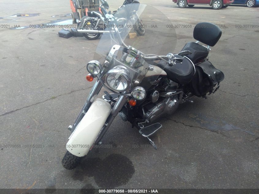 2011 HARLEY-DAVIDSON FLSTN 1HD1JD515BB015996