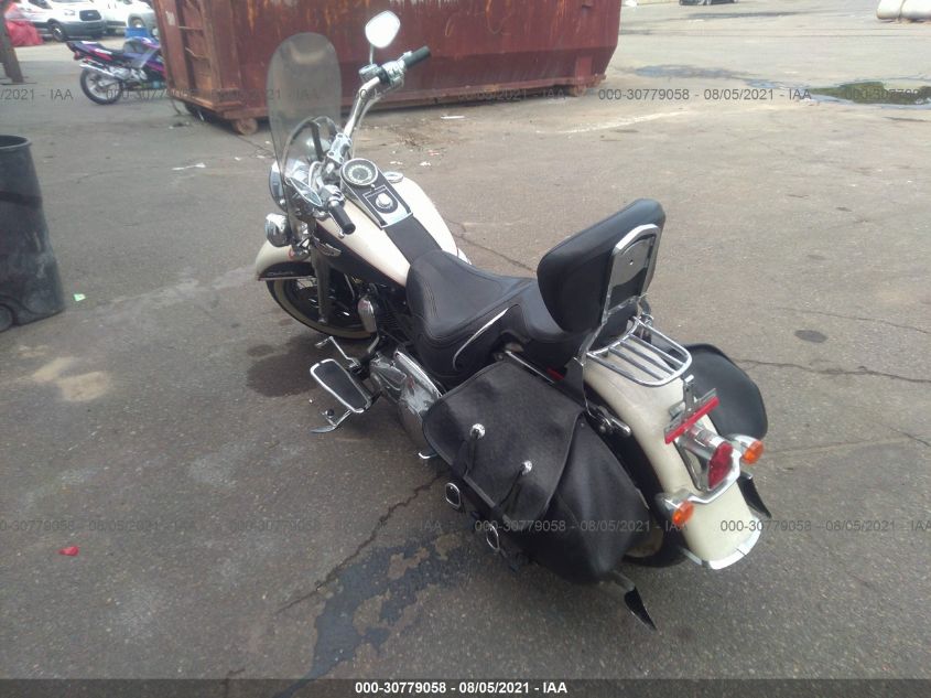 2011 HARLEY-DAVIDSON FLSTN 1HD1JD515BB015996