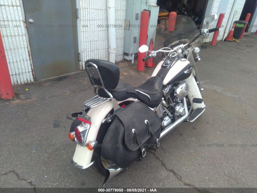 2011 HARLEY-DAVIDSON FLSTN 1HD1JD515BB015996