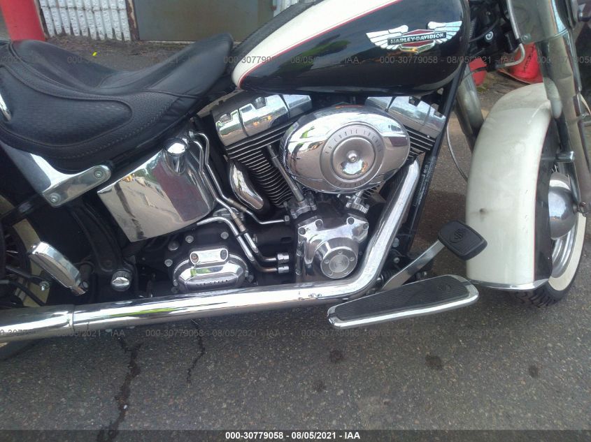 2011 HARLEY-DAVIDSON FLSTN 1HD1JD515BB015996