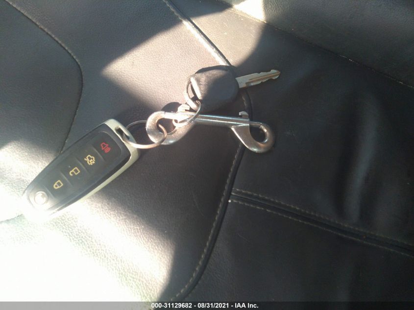 2015 FORD FOCUS TITANIUM 1FADP3J21FL201059