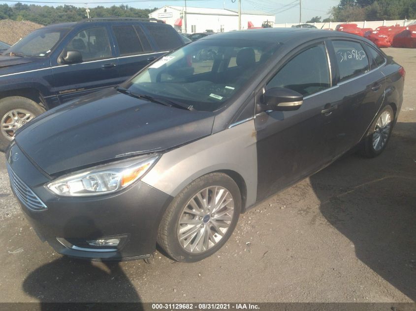2015 FORD FOCUS TITANIUM 1FADP3J21FL201059