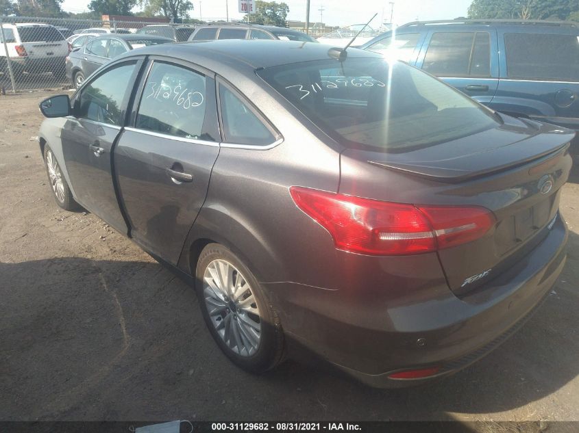 2015 FORD FOCUS TITANIUM 1FADP3J21FL201059