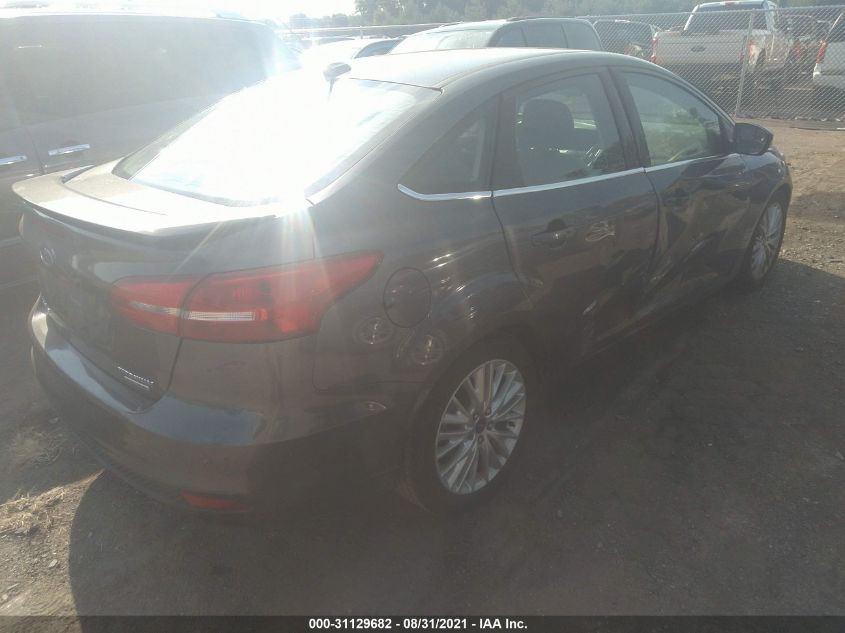 2015 FORD FOCUS TITANIUM 1FADP3J21FL201059