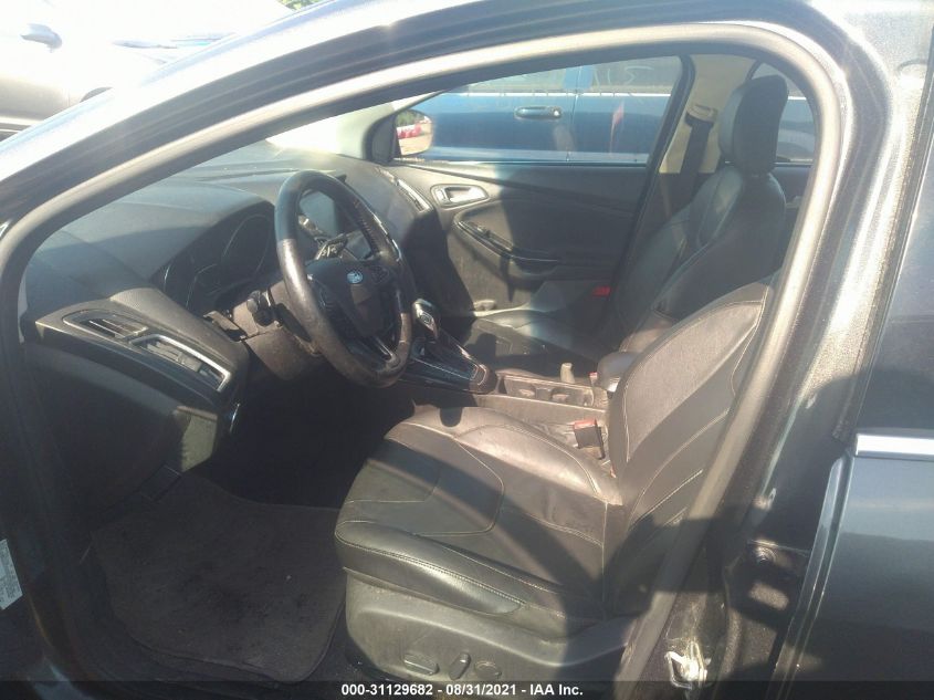 2015 FORD FOCUS TITANIUM 1FADP3J21FL201059