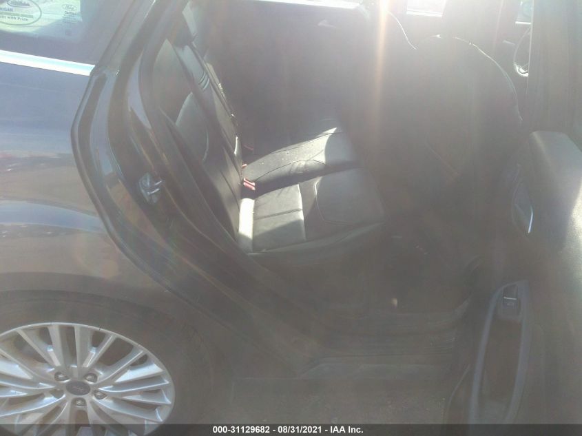 2015 FORD FOCUS TITANIUM 1FADP3J21FL201059