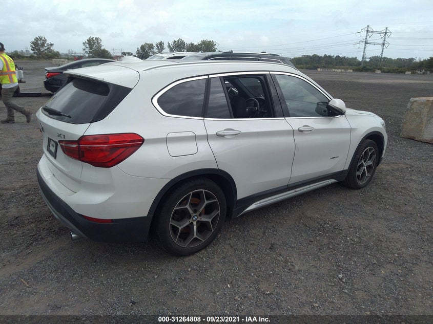 2018 BMW X1 VIN: WBXHT3C36J5K27573