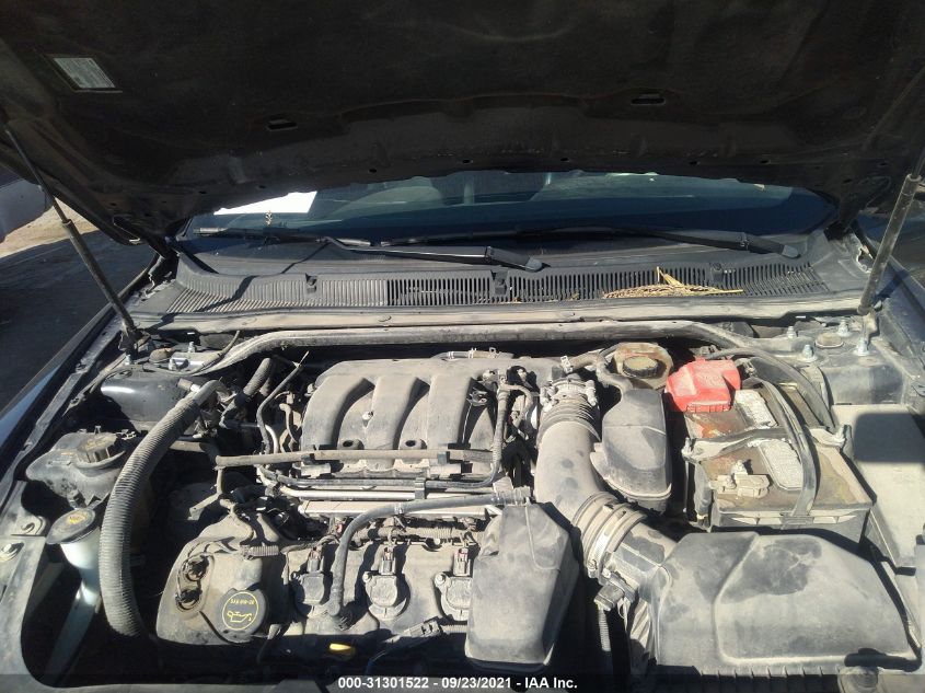 2015 FORD TAURUS SEL 1FAHP2E87FG148211