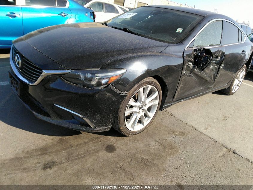 Фото: JM1GJ1T59G1484070 - 6