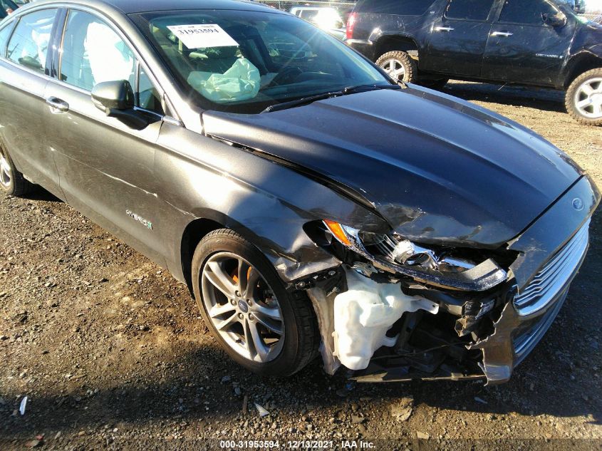 2015 FORD FUSION TITANIUM HYBRID 3FA6P0RU6FR274216