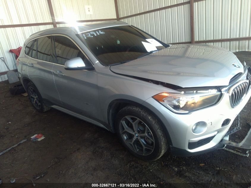 VIN WBXHT3C31J5K25634 2018 BMW X1 no.1