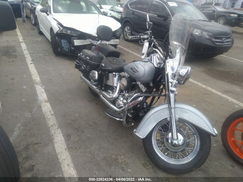 2011 HARLEY-DAVIDSON FLSTC 1HD1BW515BB048196