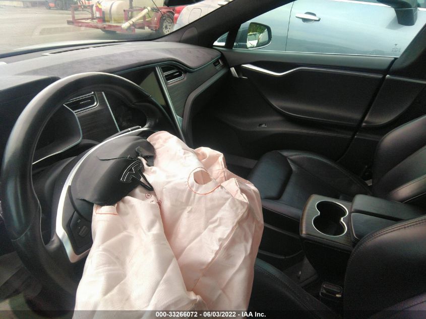 Фото: 5YJSA1E2XFF118881 - 7