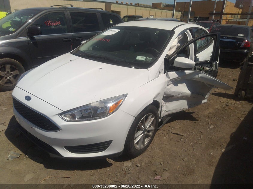 VIN 1FADP3F20JL280399 2018 FORD FOCUS SE