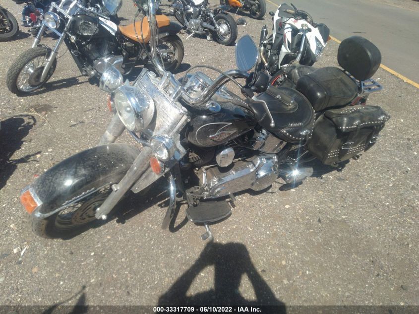 2011 HARLEY-DAVIDSON FLSTC 1HD1BW511BB046106