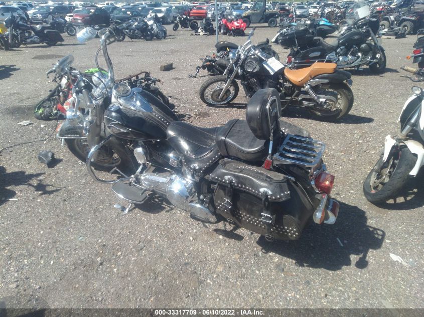 2011 HARLEY-DAVIDSON FLSTC 1HD1BW511BB046106