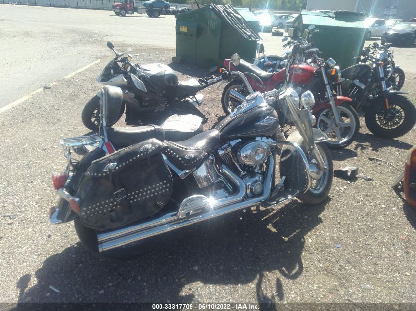 2011 HARLEY-DAVIDSON FLSTC 1HD1BW511BB046106