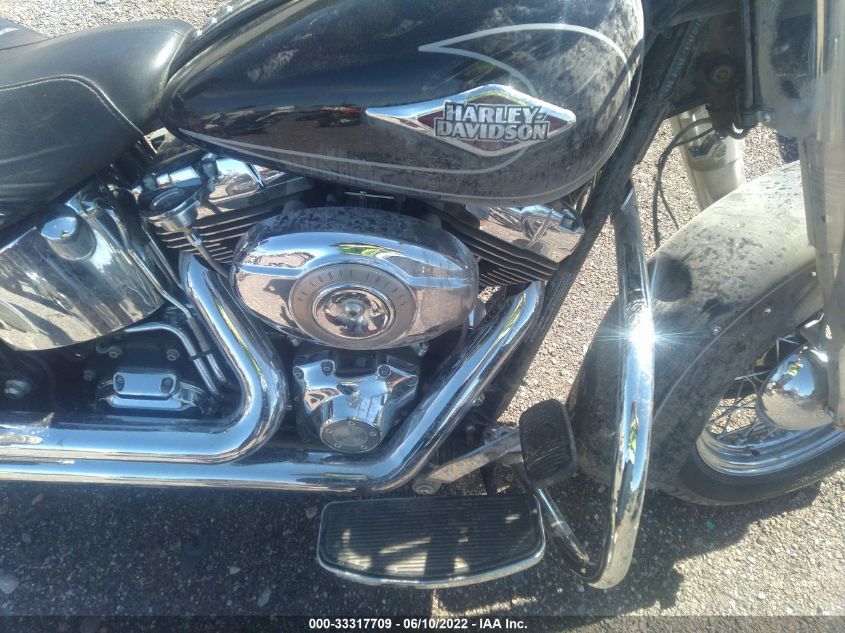2011 HARLEY-DAVIDSON FLSTC 1HD1BW511BB046106