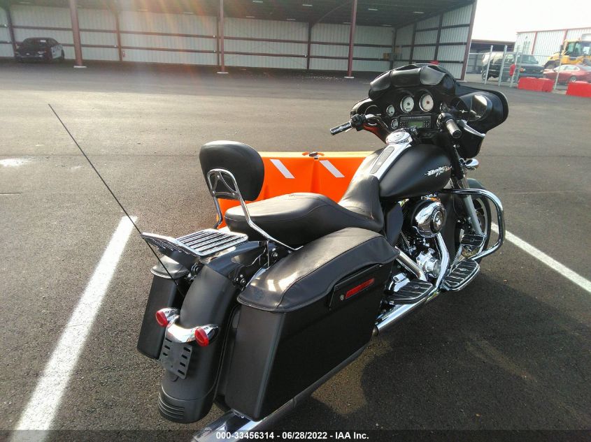 2010 HARLEY-DAVIDSON FLHX 1HD1KB415AB608985