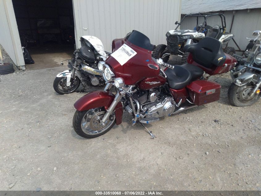 2010 HARLEY-DAVIDSON FLHX 1HD1KB413AB661779