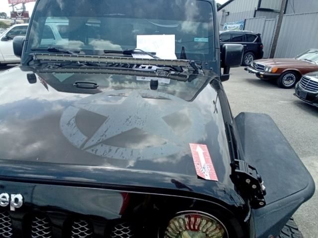 2015 JEEP WRANGLER FREEDOM EDITION 1C4AJWAG7FL572657