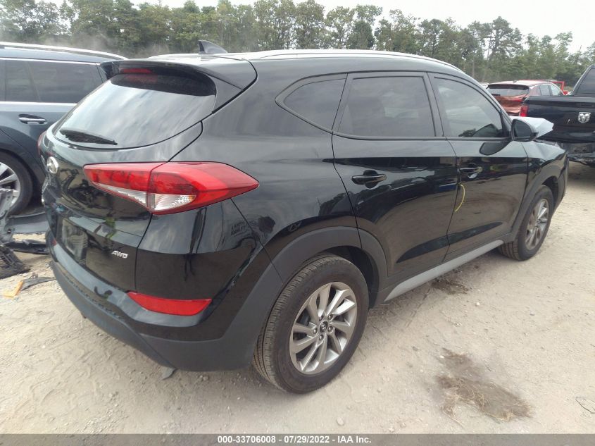 VIN KM8J3CA40JU788329 2018 HYUNDAI TUCSON no.4