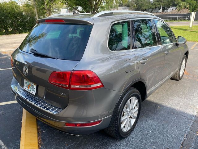 2014 VOLKSWAGEN TOUAREG SPORT WVGEF9BPXED005690