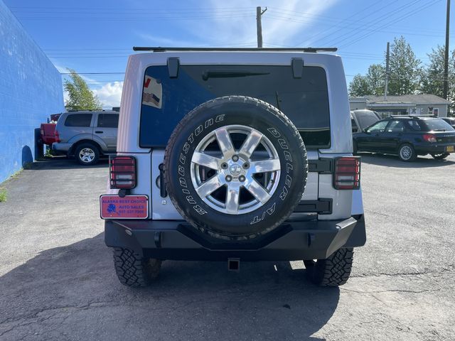 2013 JEEP WRANGLER UNLIMITED SAHARA 1C4BJWEG9DL617884