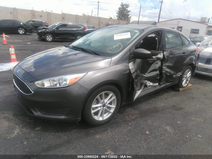 VIN 1FADP3F28JL260708 2018 FORD FOCUS SE