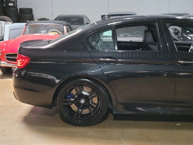 2014 BMW M5 WBSFV9C58ED593042