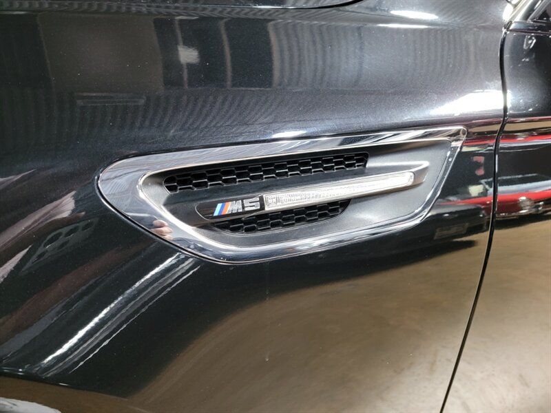 2014 BMW M5 WBSFV9C58ED593042