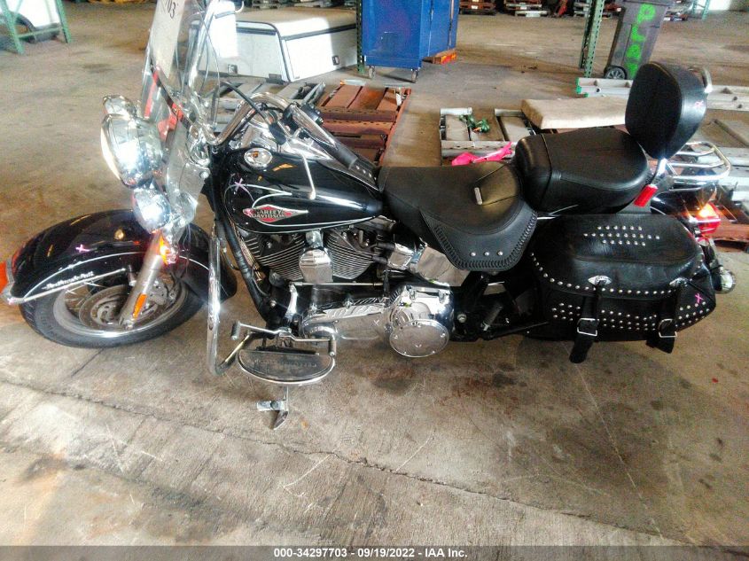 2011 HARLEY-DAVIDSON FLSTC 1HD1BW517BB014051