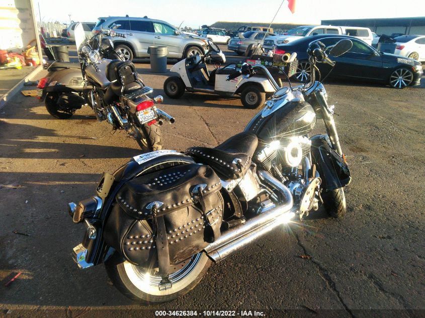 2011 HARLEY-DAVIDSON FLSTC 1HD1BW518BB017542