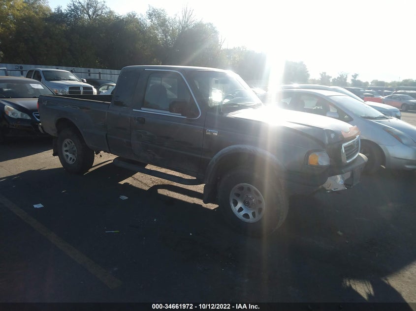 MAZDA B-SERIES 4WD TRUCK 2000. Lot# 34661972. VIN 4F4ZR17X8YTM12397. Photo 1