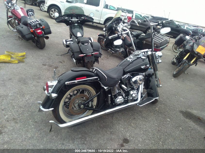 2010 HARLEY-DAVIDSON FLSTN 1HD1JD510AB033384